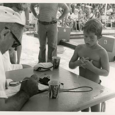 An unknown group of people at a pool