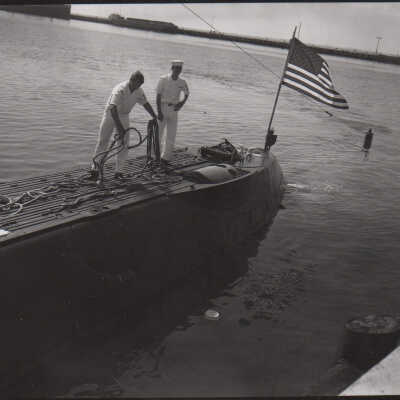 Sailors on a submarine during Navy Day, 1970