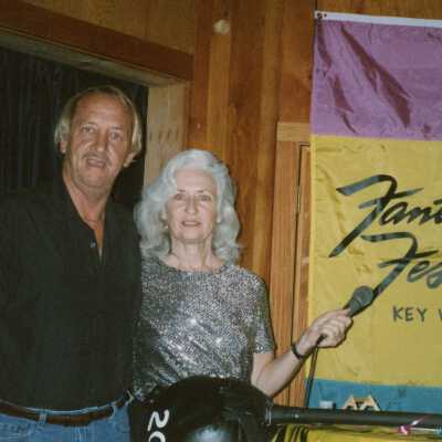 Unknown man and woman at an award ceremony.