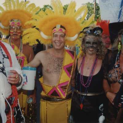 Five unknown people dressed up.