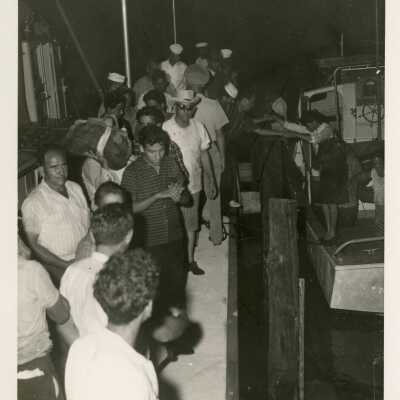 Unknown people on a pier
