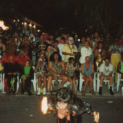 Unknown people watching the parade.