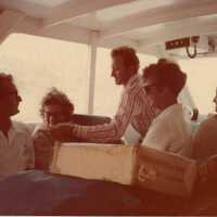 A group of people sitting on a boat