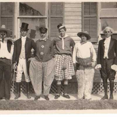 Unknown men in costumes