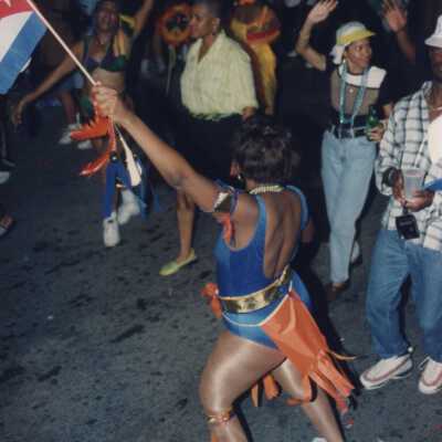 Unknown people walking on street.