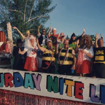 Unknown group of people on a float that reads Saturday Nite Live.