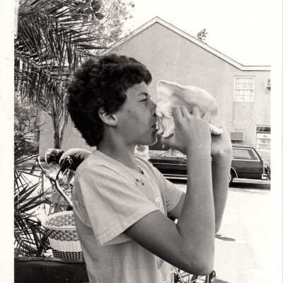 Boy with conch shell