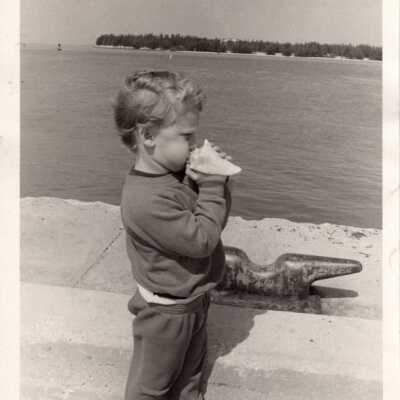 Young boy with conch shell: Copyright: © Key West Art & Historical Society; Origformat: Print-Photographic