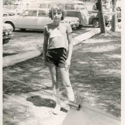 Unknown child standing outside