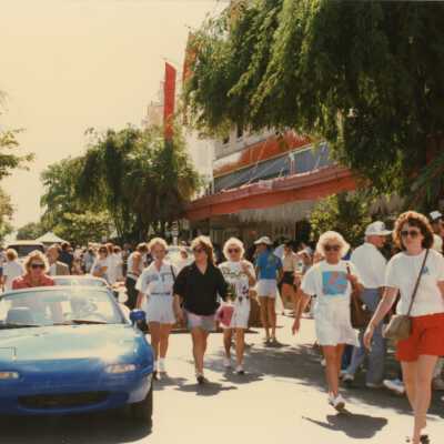 A group unknown people walking on Duval Street.
