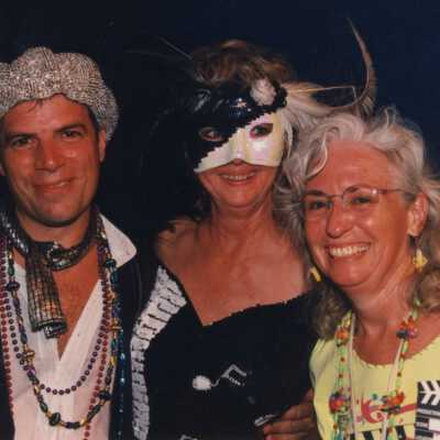 Two unknown woman with an unknown man.