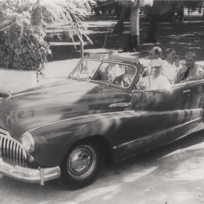President Truman driving a car