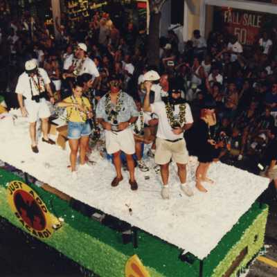 Unknown people on a float in the parade.