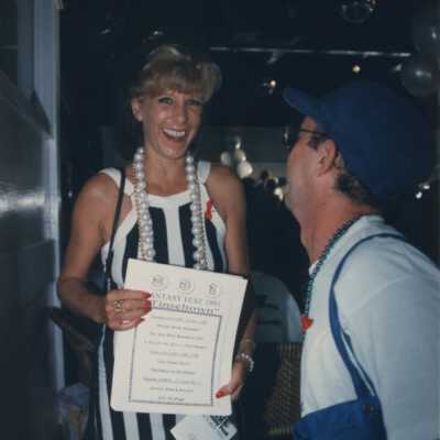 Unknown people talking.