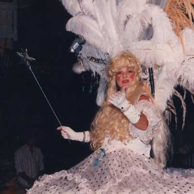 Unknown person dressed up on a float.