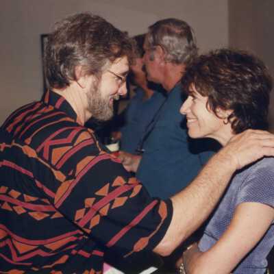 Unknown people talking during the Fantasy Fest meeting.