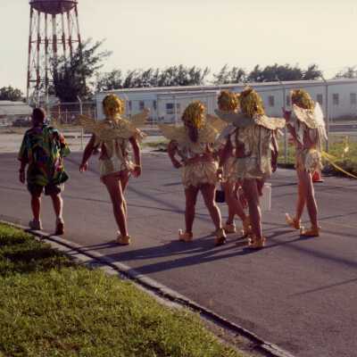 Unknown people dressed up.