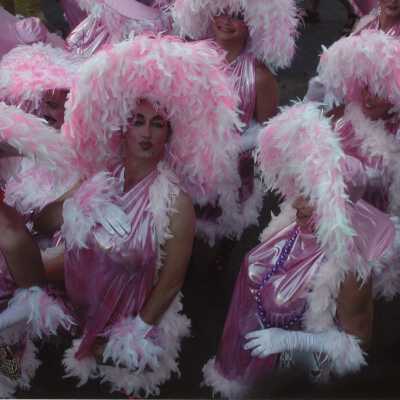 Unknown people dressed up.