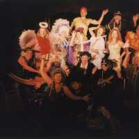 A group of unknown people dressed up.