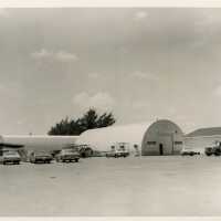 Buildings on base with vehicles parked outside