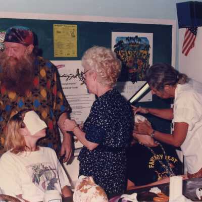 Unknown people making face mask.