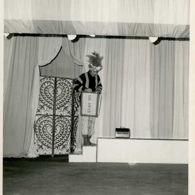 Unknown man dressed up on a stage