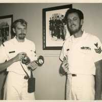 2 Unknown men in uniform