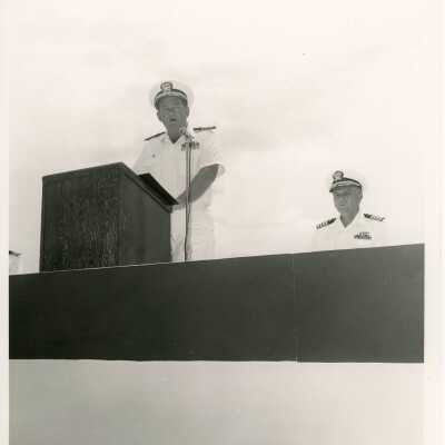2 Unknown men in uniform at a ceremony