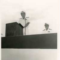 2 Unknown men in uniform at a ceremony