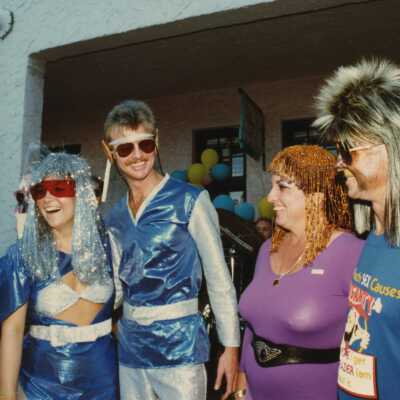 Unknown people dressed up working.