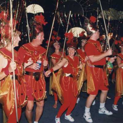 Shape U family fitness people walking in the parade.