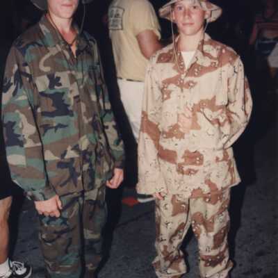 Unknown boys dressed up as if they were in the military.