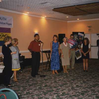 Unknown people at some sort of ceremony.