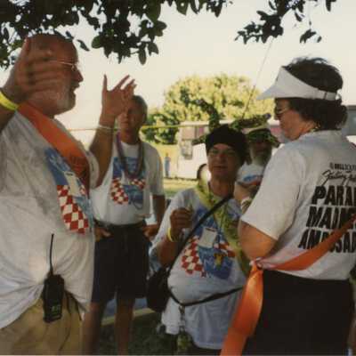 Unknown people talking.