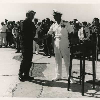 Unknown people standing at a ceremony