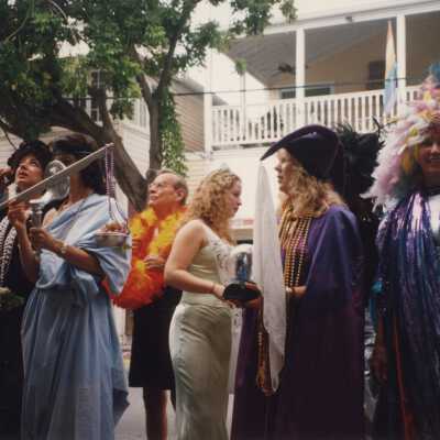 Unknown people dressed up.