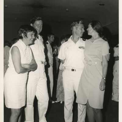 Unknown people at a party talking