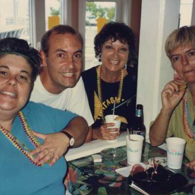 Melissa Kendrick, Tom Luna, Madeleine Burnside, and an unknown lady sitting at a table.