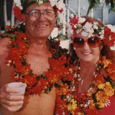 Two unknown people dressed up.