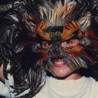 Unknown child with a mask on at the Goombay celebration.