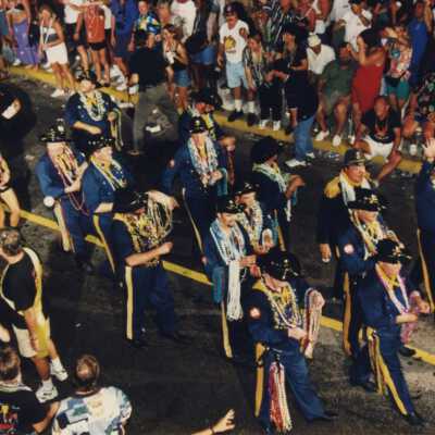 Unknown people dressed up in the parade.