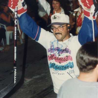 Fantasy Fest monitor walking down the Duval Street.