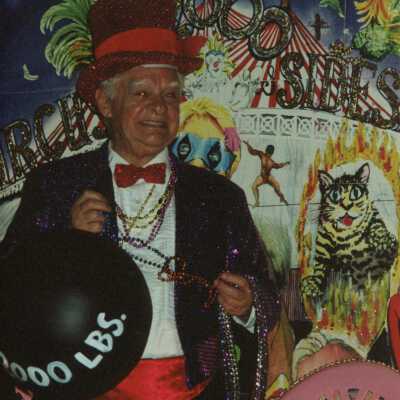 Unknown man dressed up on a float.