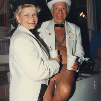 Unknown couple dressed up.