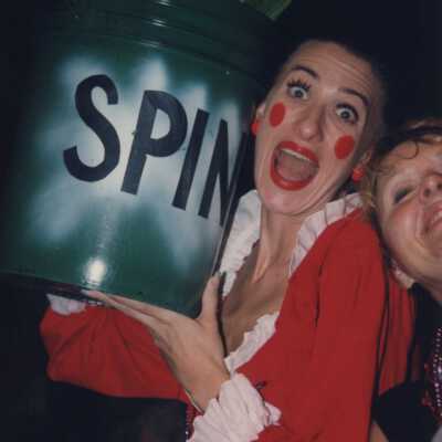 Two unknown woman dressed up.