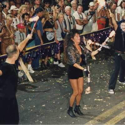 Unknown people juggling in the street for the parade.