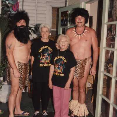 Dennis Beaver's mother standing outside of the Tropical Inn at 812 Duval Street with three unknown people.