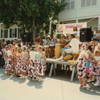 Unknown people at a street fair.