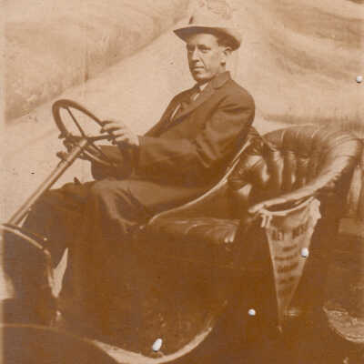Unknown Man 'Jimmie' in an Early Model Automobile