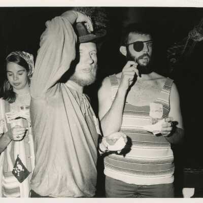 3 Unknown people at a party